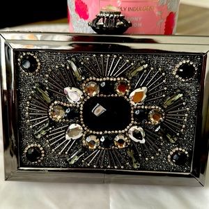 Aldo black party clutch.excellent condition brand new.hand made elegant style.